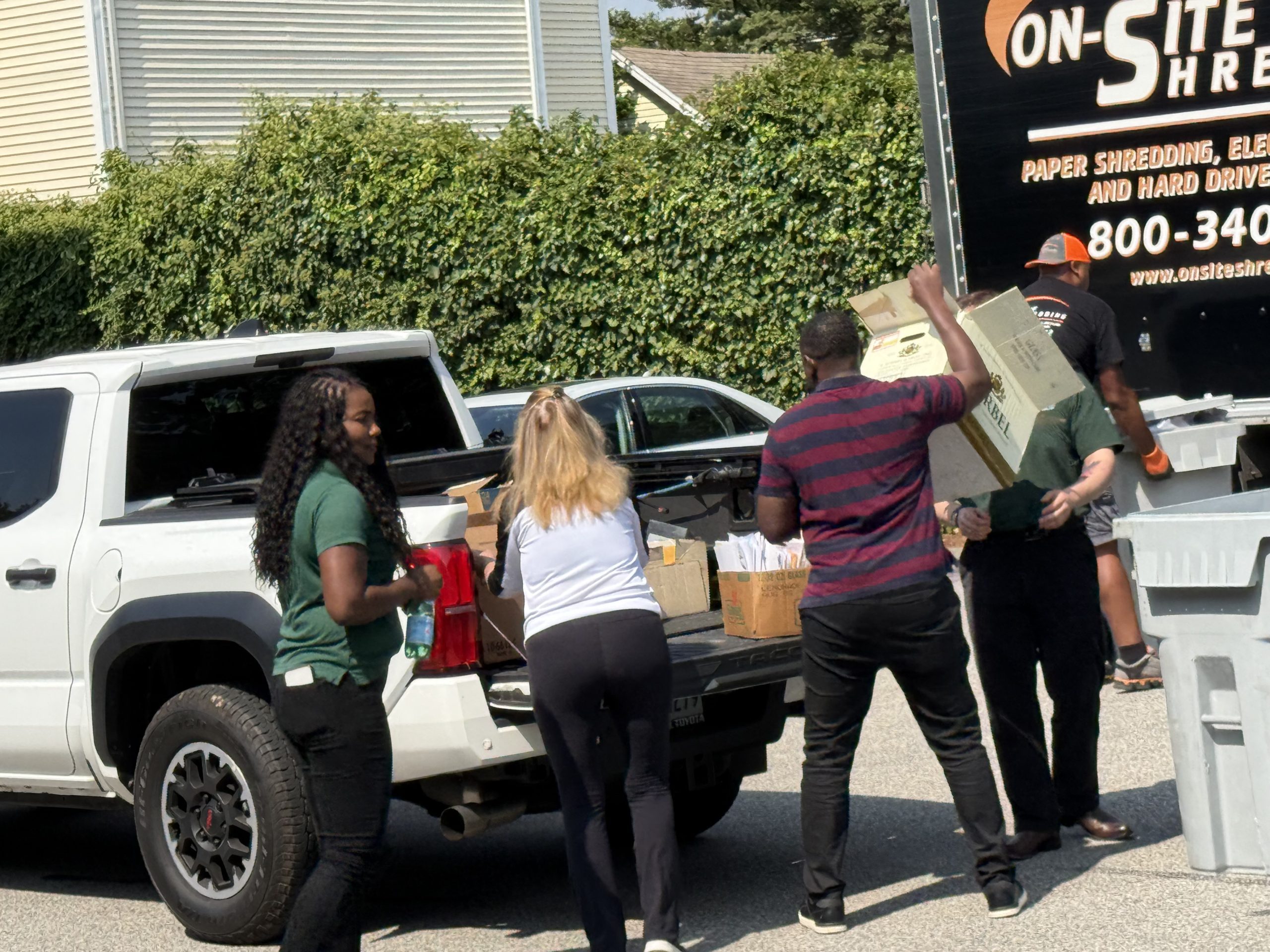 photo of people preparing to shred documents at the Connecticut Community Bank community shred day