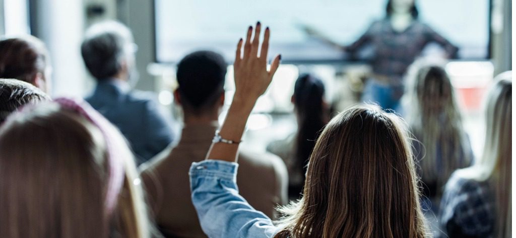 photo of people attending a presenation